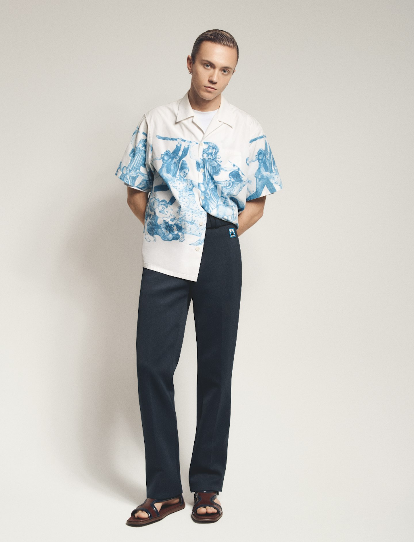 Henrik wearing head-to-toe Prada, all found on Vinted.